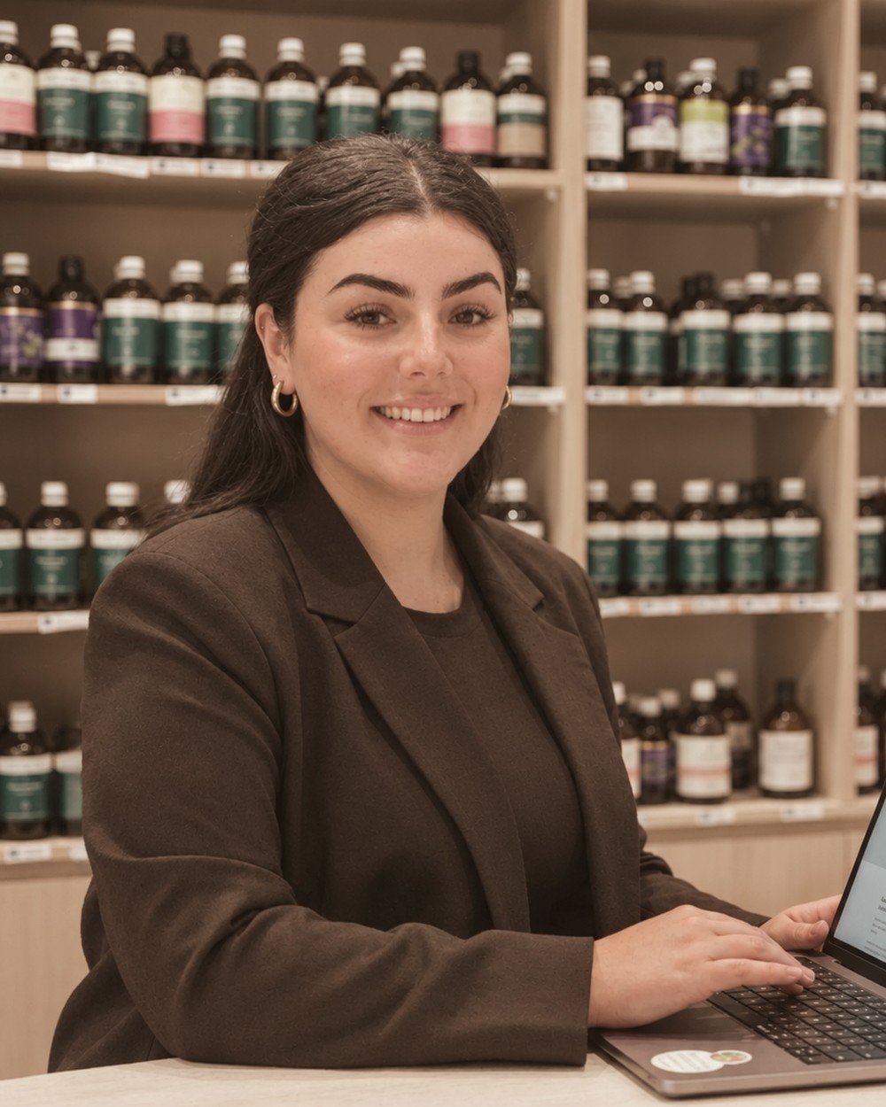 Elise Kossivas, naturopath and herbalist, in the clinic dispensary